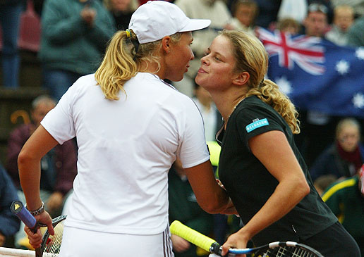 Alicia-Molik-and-Kim-Clijsters-congratulate-each-other-after-an-on-court-meeting-in-2002..jpg