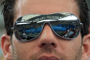 Pat Rafter Arena through the reflection in a spectator's sunglasses